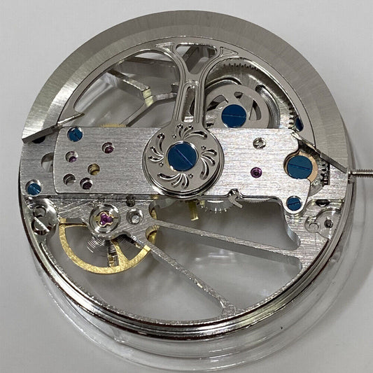 China Made Carved Bare Balance watch with hollow automatic mechanical movement, precise craftsmanship.