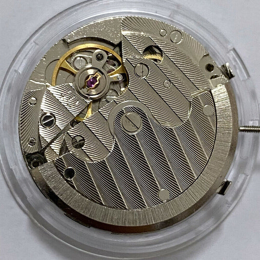 Tianjin T16 automatic watch movement with small seconds at 2, 6, and 10 o'clock positions by China Made.