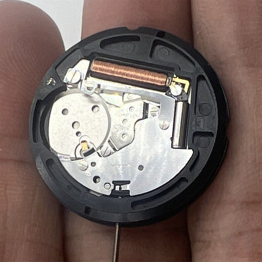 Ronda 517 Swiss quartz watch movement displaying day and date at 6 o'clock, standard height.