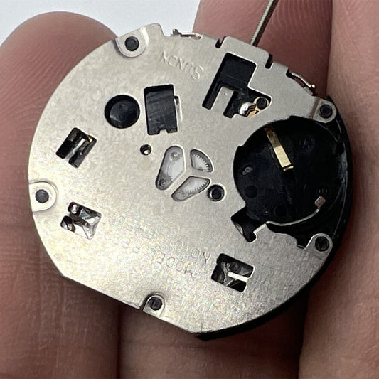 Sunon PE90 quartz watch movement with date at 3, small second at 6, and classic 3-hand design.