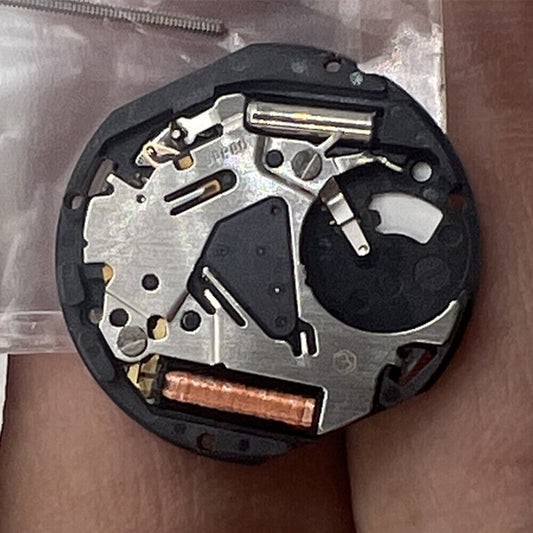 Hattori Epson VX19E quartz watch movement with date at 6, precision Japan made mechanism.