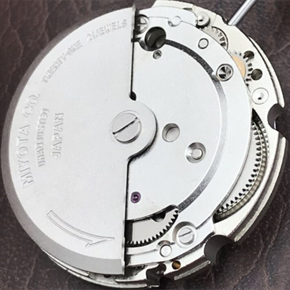 Citizen Men?s 8200 Automatic Watch with Genuine Japan Silver Case, mechanical movement displayed.