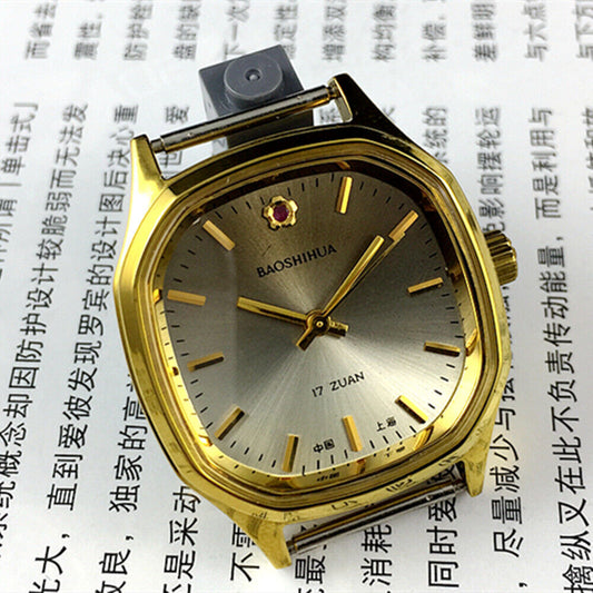 32mm Shanghai brand manual watch with golden nail markers, brown dial, and octagonal case design.