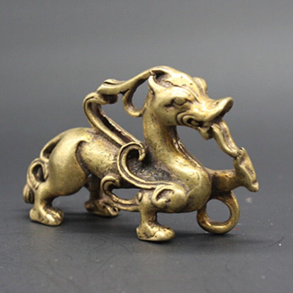 Hand-carved solid copper dragon trinket with vintage bronze finish, collectible decor.