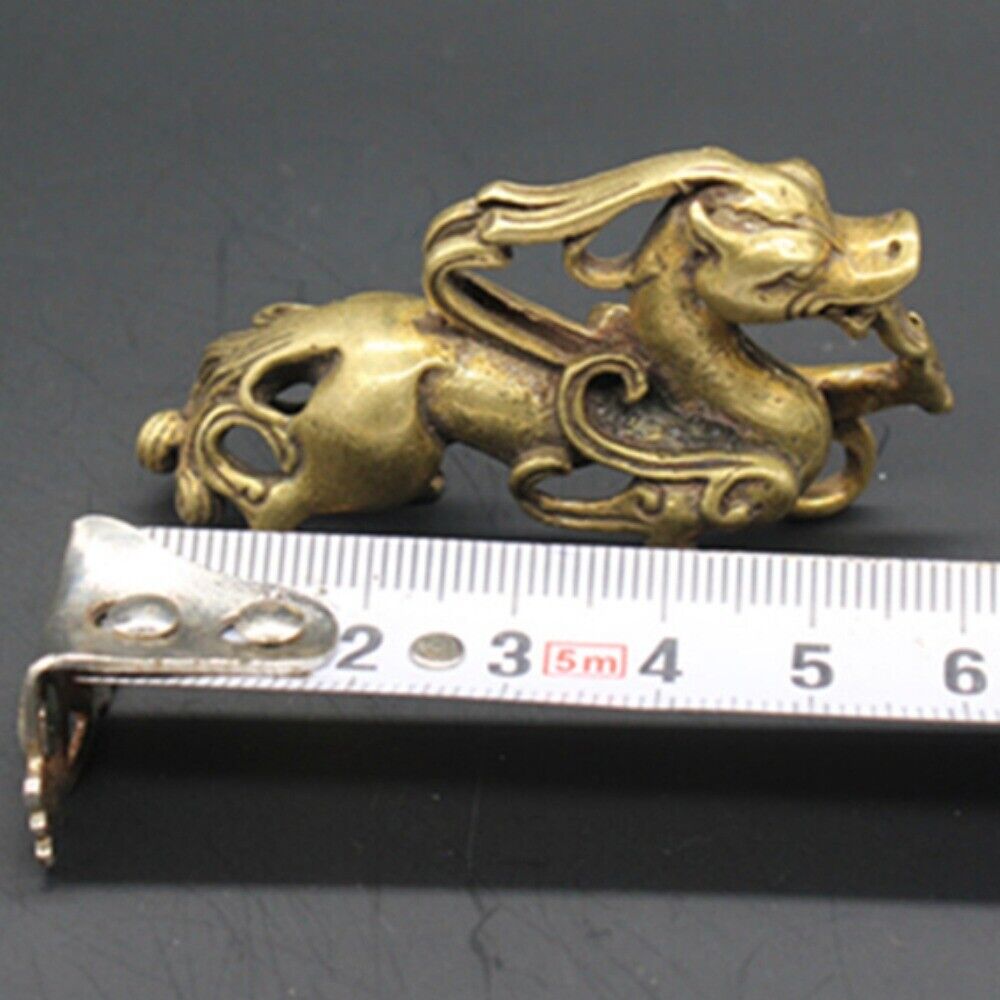 Solid copper dragon trinket with vintage bronze finish, hand-carved details, collectible decor piece.