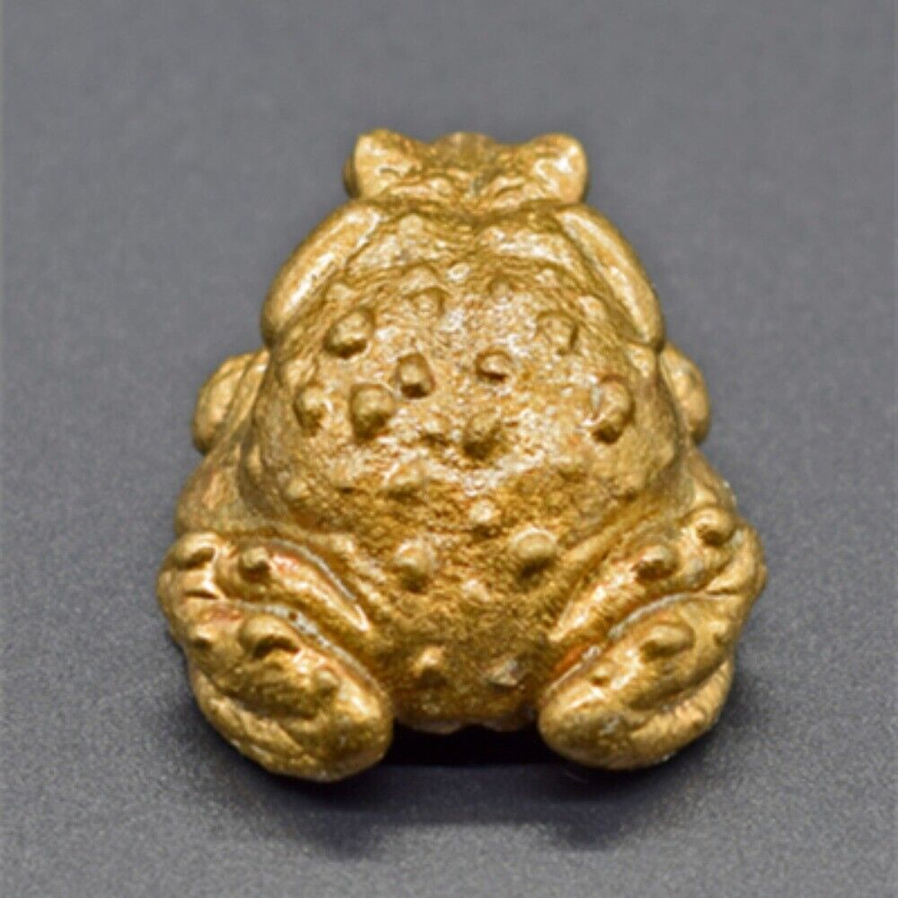 Hand-carved vintage solid copper toad figurine, detailed bronze collectible sculpture.