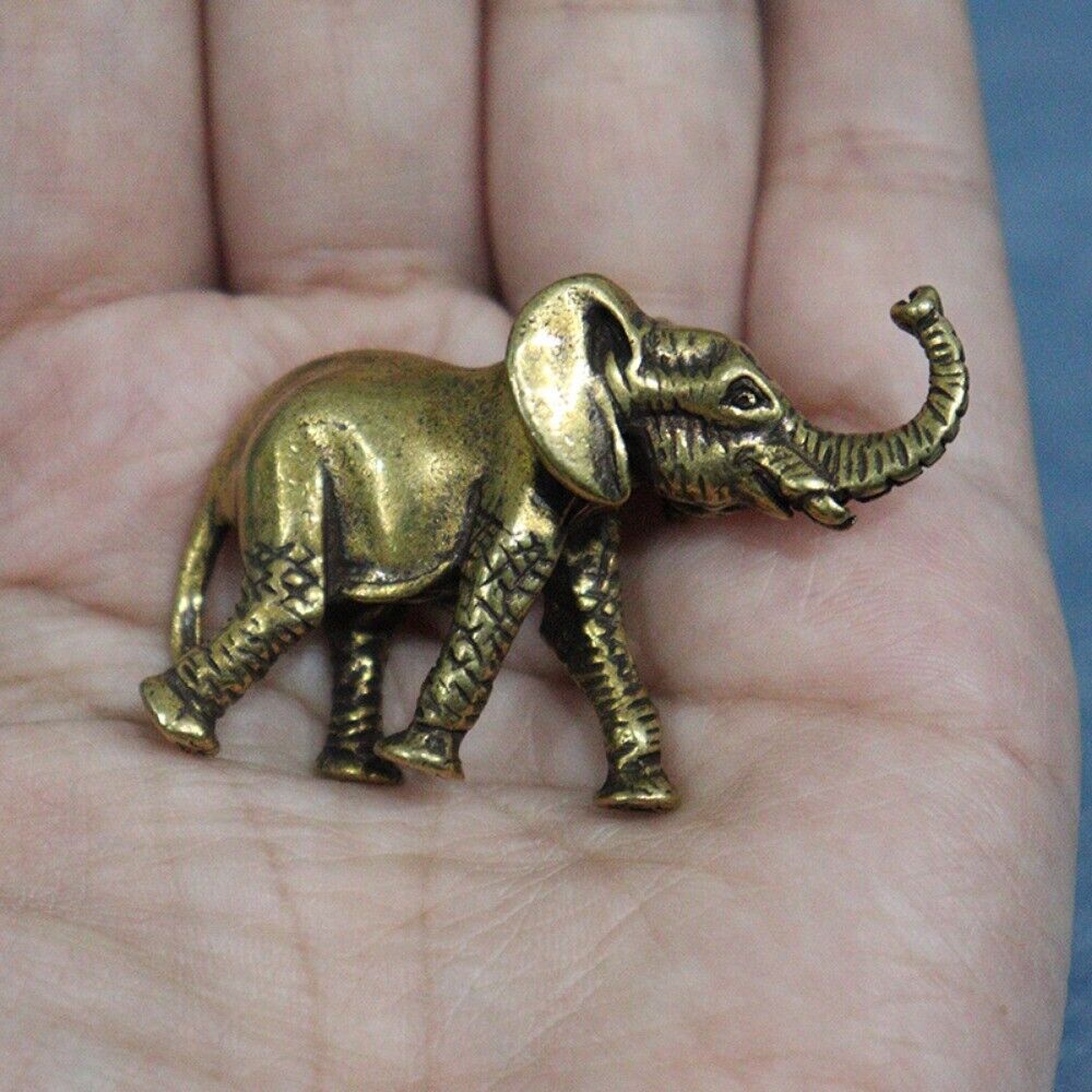 Hand-carved solid copper elephant trinket, vintage bronze decor figurine for watch accessory display.