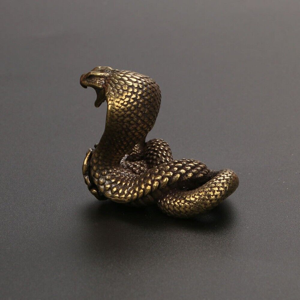 Hand-carved solid copper cobra trinket with vintage bronze finish, collectible decor for home or office.