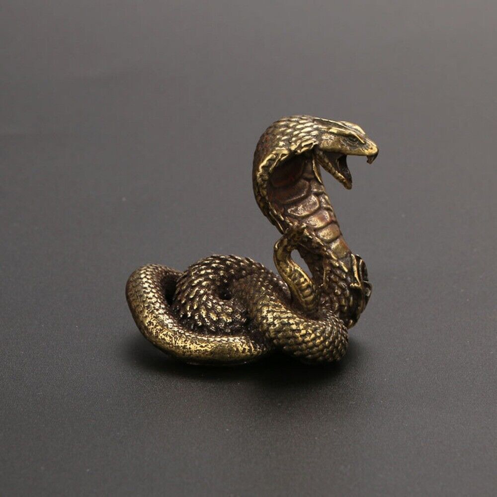 Hand-carved solid copper cobra trinket, vintage bronze finish, perfect collectible decor.