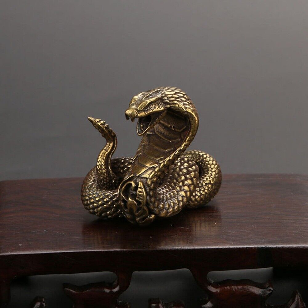 Hand-carved solid copper cobra trinket, vintage bronze finish, collectible home decor accessory.