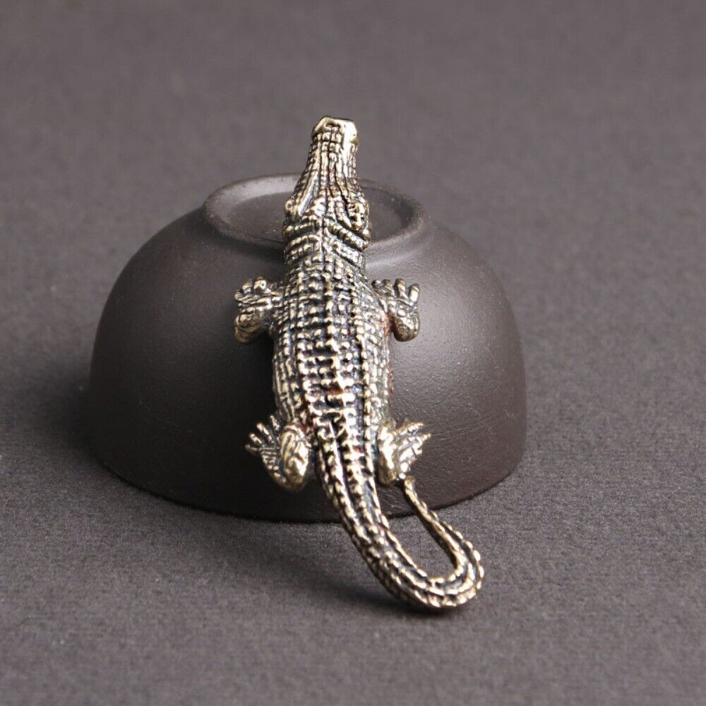 Hand-carved solid copper crocodile figurine by Bronze Model, detailed trinket for elegant watch accessory displays.