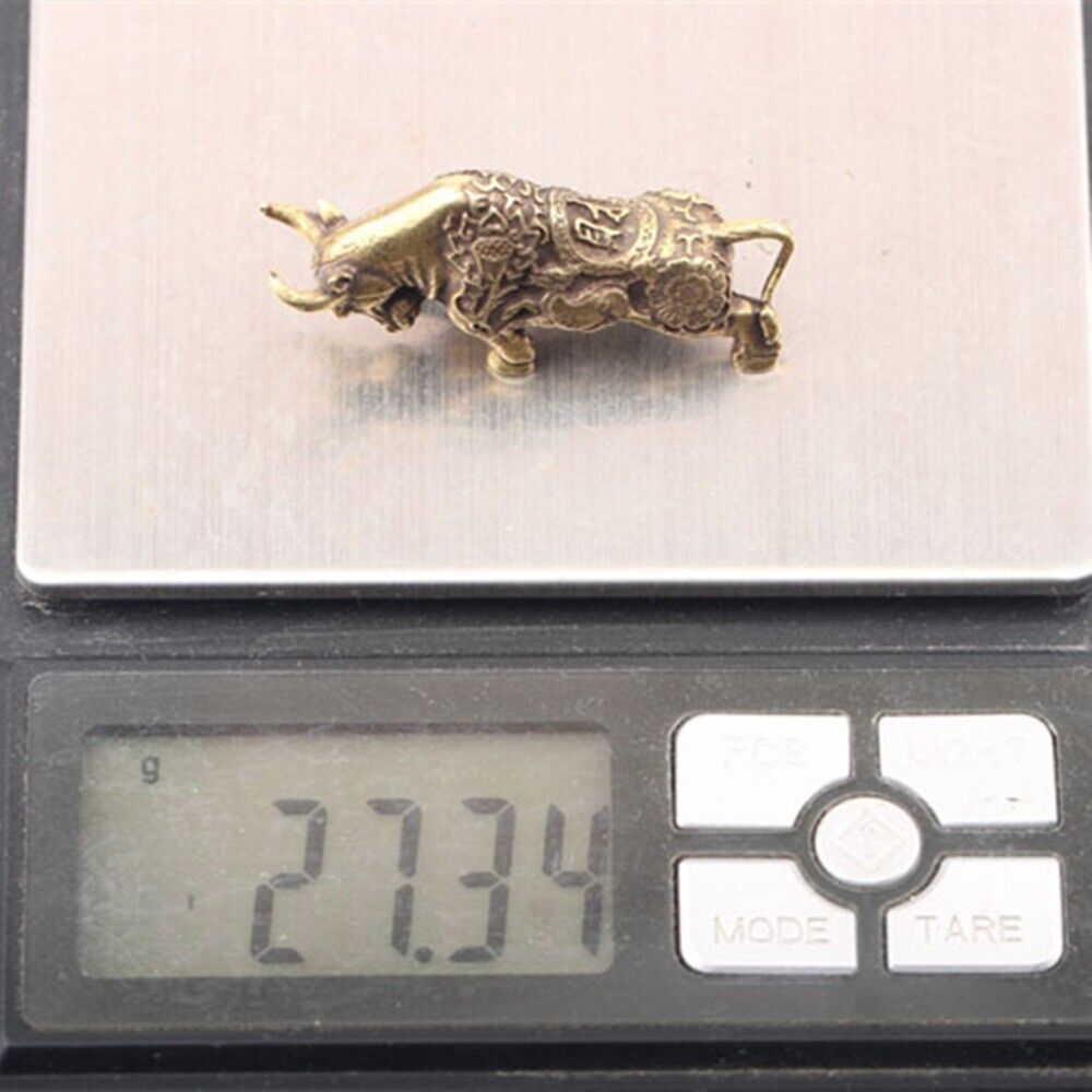 Solid copper bull figurine with intricate hand-carved bronze design, vintage collectible for decor.