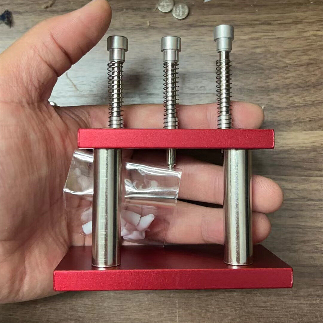Aluminum watch hand press set with 3 heads and 7 dies for precise watch hand fitting.