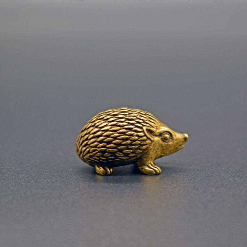 Solid copper hedgehog trinket, vintage hand-carved bronze figurine for watch accessories display.