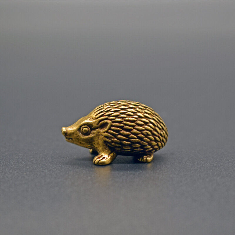 Solid copper hedgehog trinket, vintage hand-carved bronze figurine with intricate details.