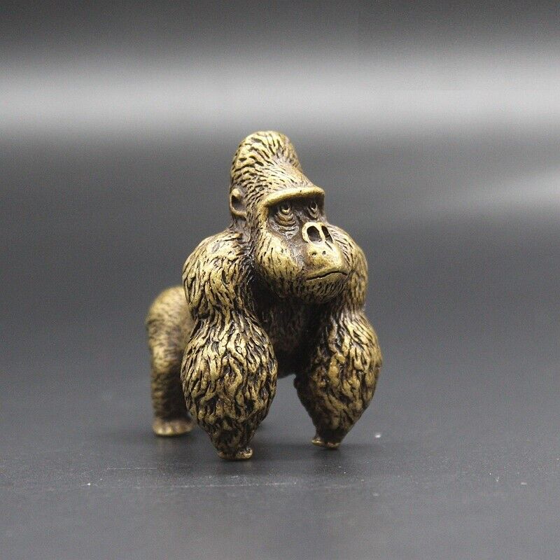 Vintage handmade solid copper gorilla figurine, detailed bronze carving for collectors.