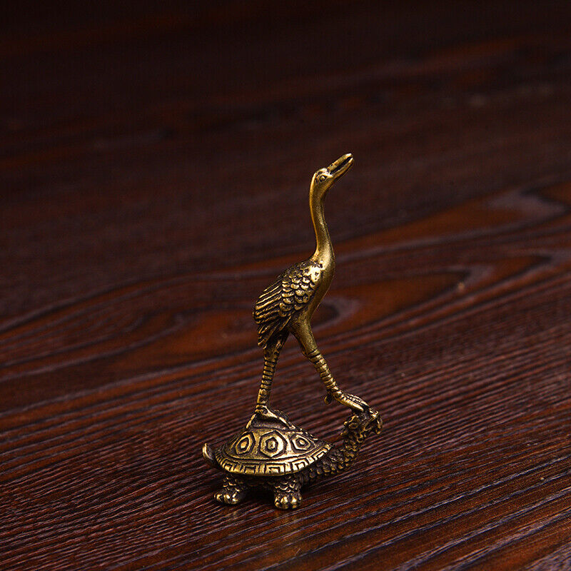 Vintage hand-carved solid copper turtle trinket, showcasing intricate craftsmanship.