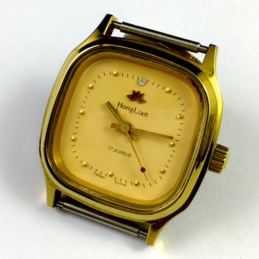 HONGLIAN manual mechanical watch with golden nail markers, square gold case, yellow dial for stylish, elegant wear.