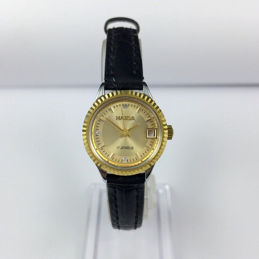 HAIDA 23mm gold manual mechanical lady watch with 17 jewels and round golden case, elegant design.