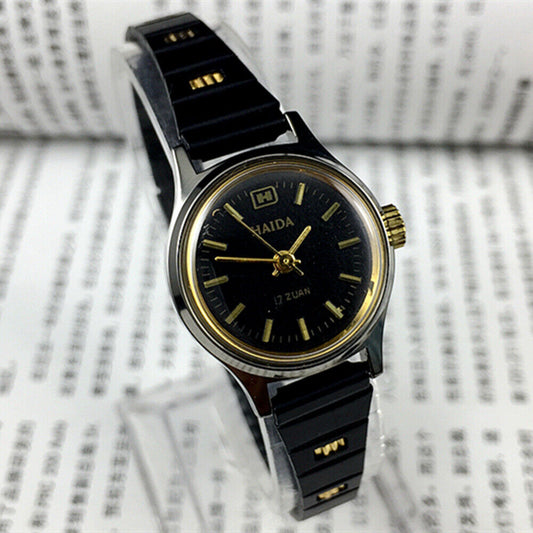 Elegant 23mm HAIDA lady watch with golden nail markers, black dial, 17 jewel mechanical movement, 3 hands