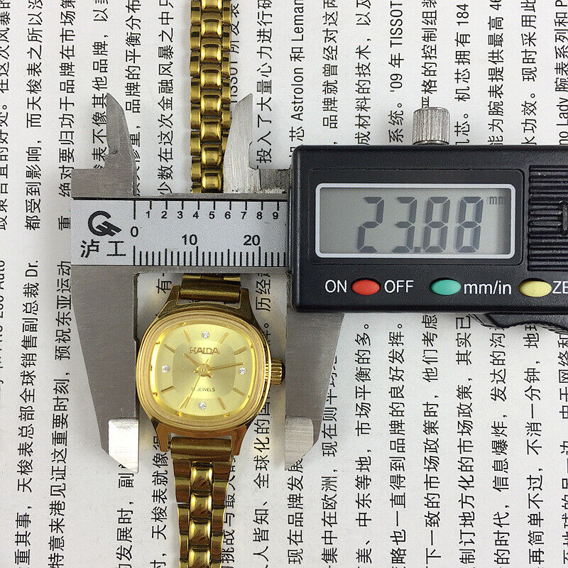 Elegant 24mm HAIDA gold ladies watch with imitation diamonds, perfect for stylish and formal occasions.