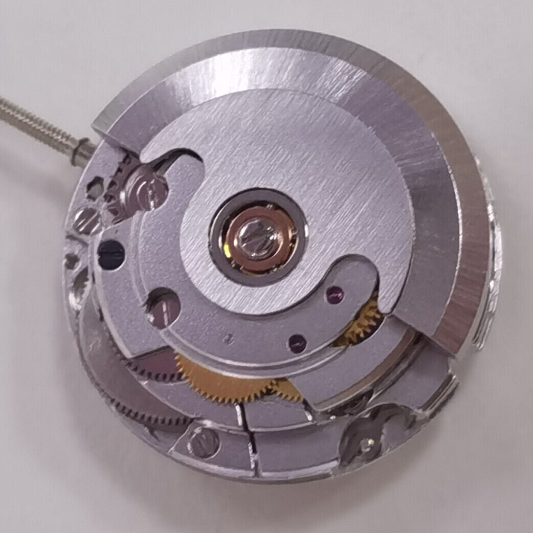 Silver replacement mechanical watch with date at 3 o'clock, China-made ETA2671 movement accessory.