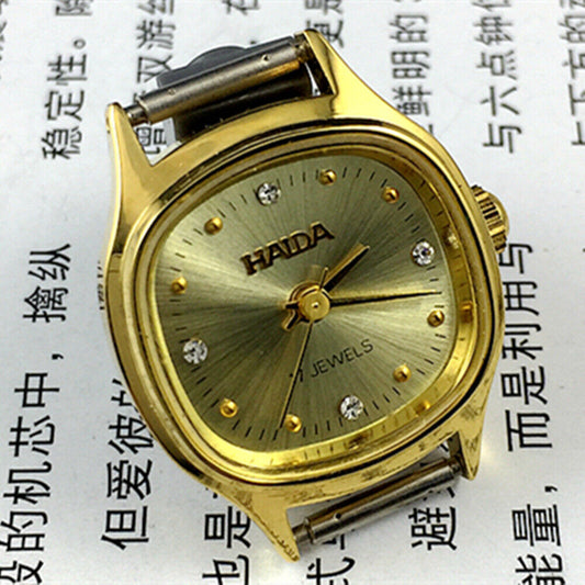 22mm HAIDA manual mechanical lady watch with golden nail accents and 17 jewels in a square golden case