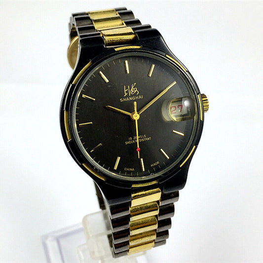 37mm Shanghai Factory manual mechanical watch with black dial, 19 jewels, shock-resistant design for durability.