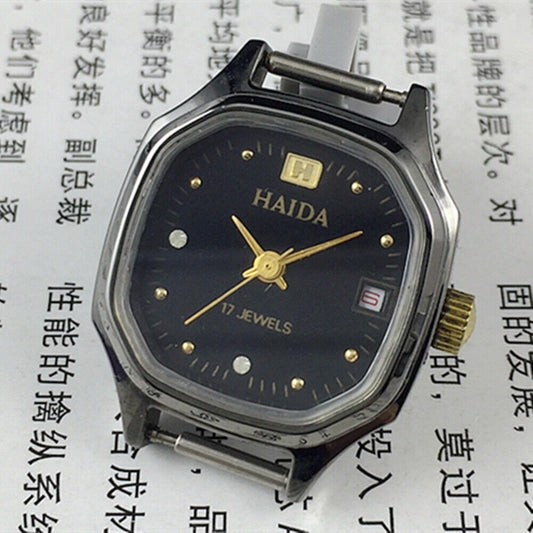 Manual mechanical lady watch with octagonal case, imitation diamonds, 17 jewels, elegant design for formal wear.