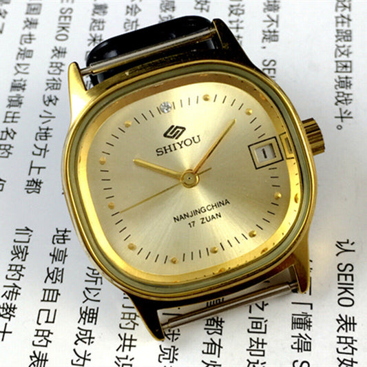 35mm China Made manual mechanical watch with golden dial and case, single calendar feature.