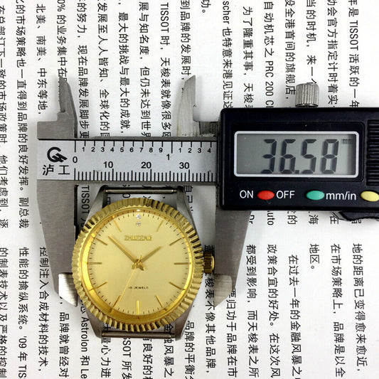 36mm golden round case Tianjin manual mechanical ladies watch with stylish band for elegant wear.