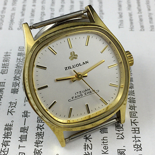 17 Jewels Chinese manual mechanical watch with golden nails, silver dial, shock-resistant design.