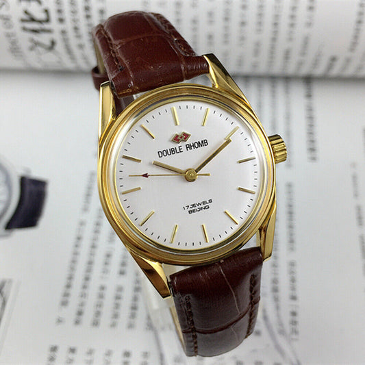 Beijing Double Rhomb manual watch with golden nails and polished golden case, classic Chinese craftsmanship.