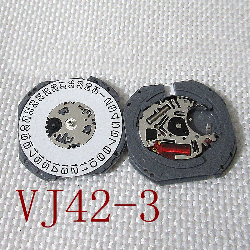 Hattori Epson TMI VJ42 watch quartz movement with date at 3 and 6, Japan made precision mechanism.