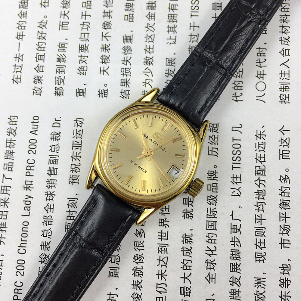 Montre mécanique à cadran rond pour femme, cadran doré, calendrier simple, motif mouette
