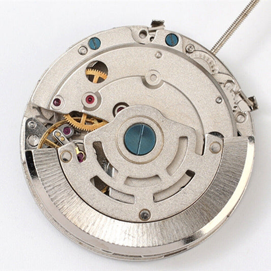 Dandong 8217 silver multifunctional automatic watch movement showcasing precise mechanical engineering.