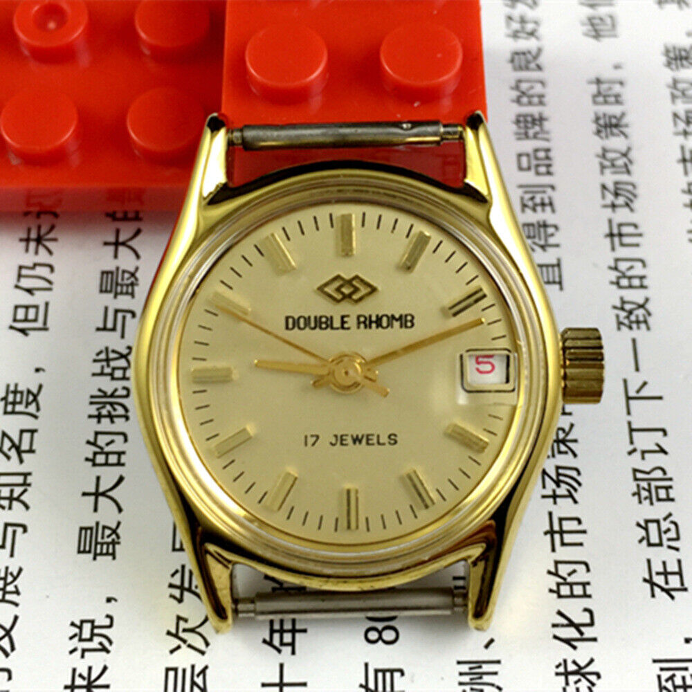 Beijing Double Rhomb Lady Watch with red date, manual mechanical movement, elegant calendar design, classic style.