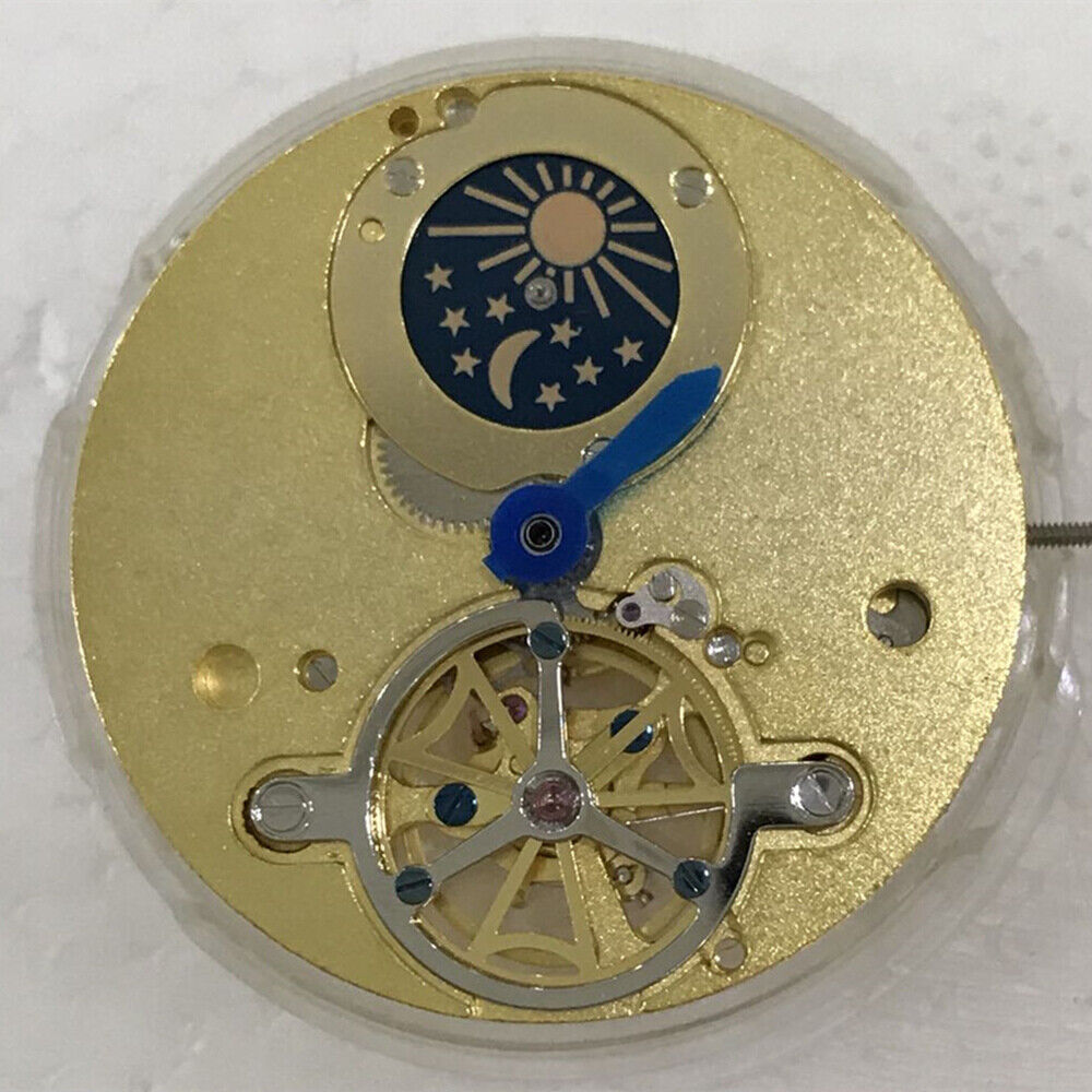 Golden automatic watch with multifunctional star and moon phase at 12 o?clock, mechanical movement at 6, premium design.