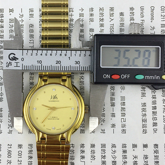 34mm Shanghai Factory manual watch with golden case and yellow dial, classic mechanical timepiece for enthusiasts