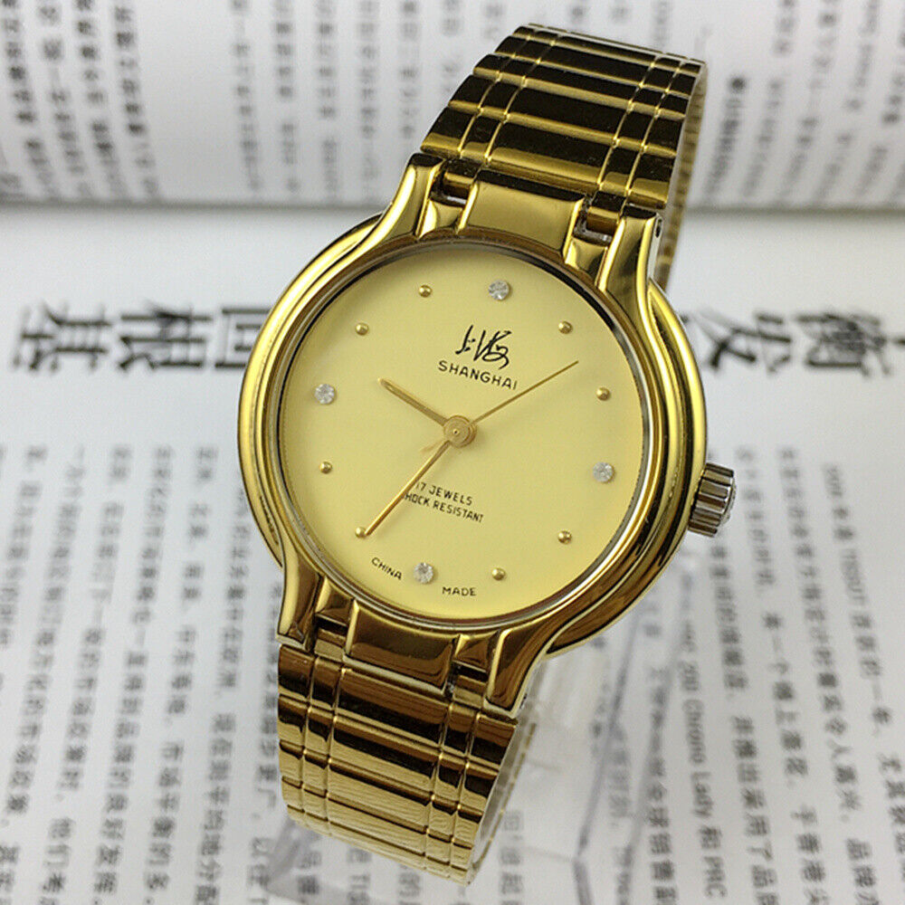 Shanghai Factory 34mm manual watch with golden case, yellow dial, classic mechanical timepiece for collectors.