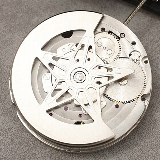 Dandong Silver hollow star moon phase watch with automatic mechanical movement, elegant timepiece design.