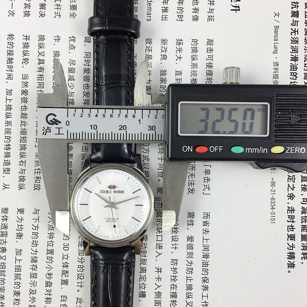 Beijing 31mm manual mechanical watch with silver case, double rhomb dial, showcasing elegant craftsmanship and classic design.