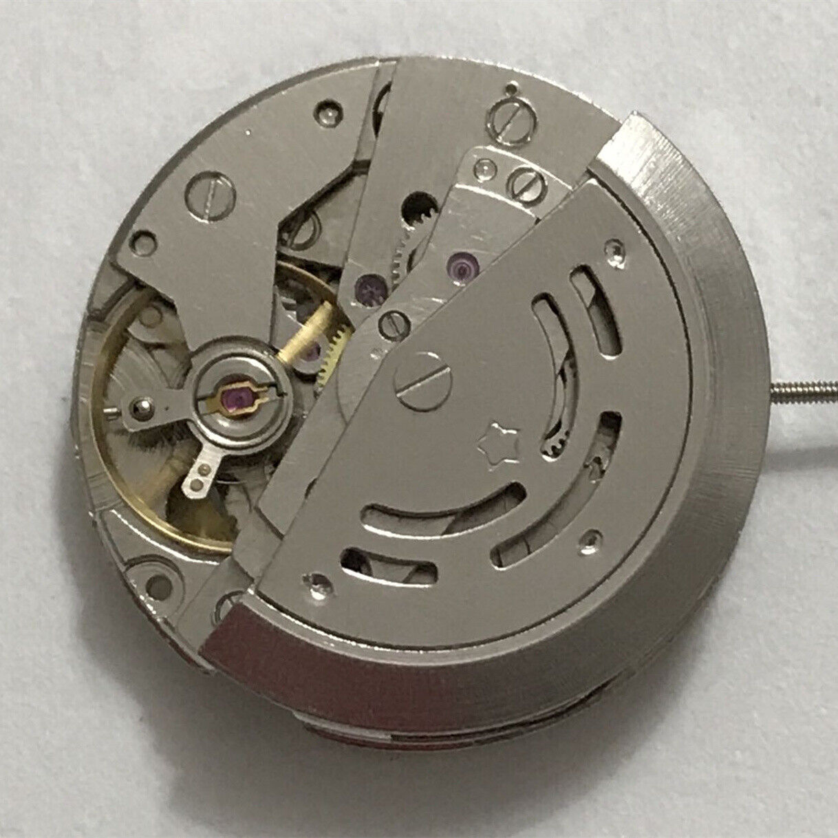 Dandong 7120 automatic watch with 3 hands and single calendar, elegant mechanical timepiece.