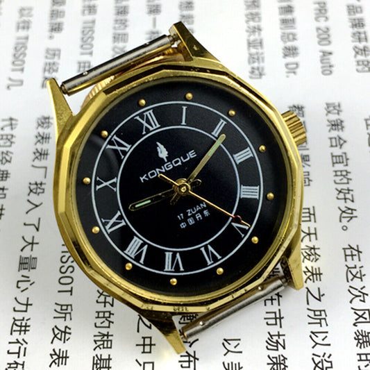 33mm Dandong manual mechanical watch with black dial, golden nails, and 3 hands for precise timekeeping.