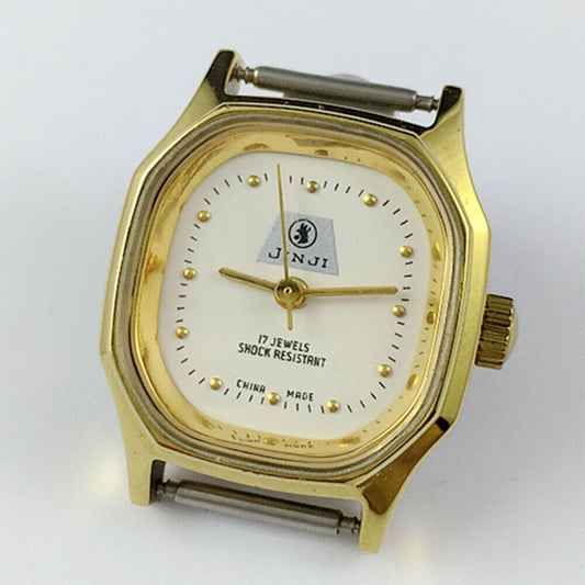 SHANGHAI JINJI 26mm manual mechanical lady watch with golden octagonal case and 17 jewels.