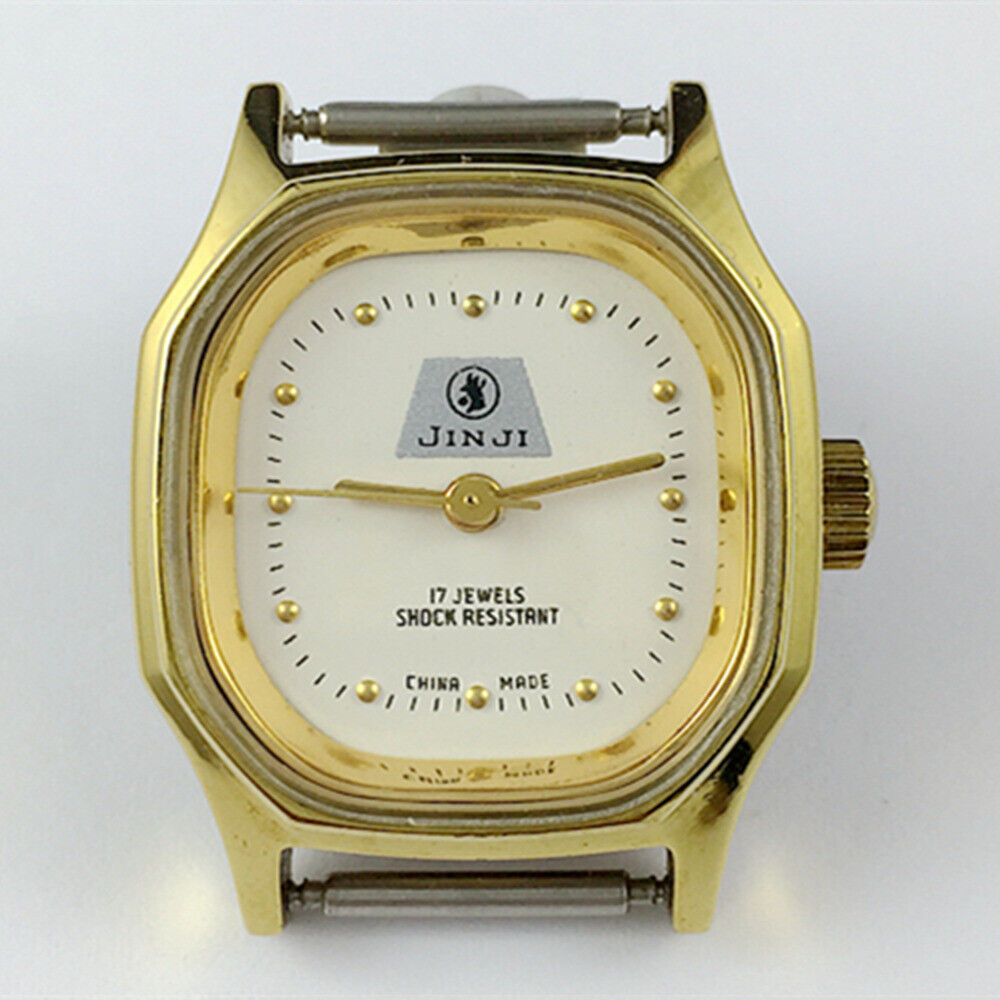 SHANGHAI JINJI 26mm lady watch with golden octagonal case, manual mechanical movement, and 17 jewels detail.