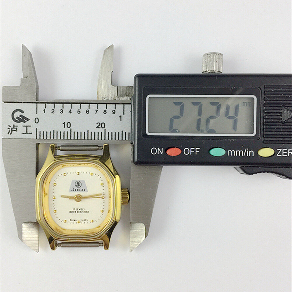 SHANGHAI JINJI 26mm lady watch with golden octagonal case, manual mechanical movement, and 17 jewels.