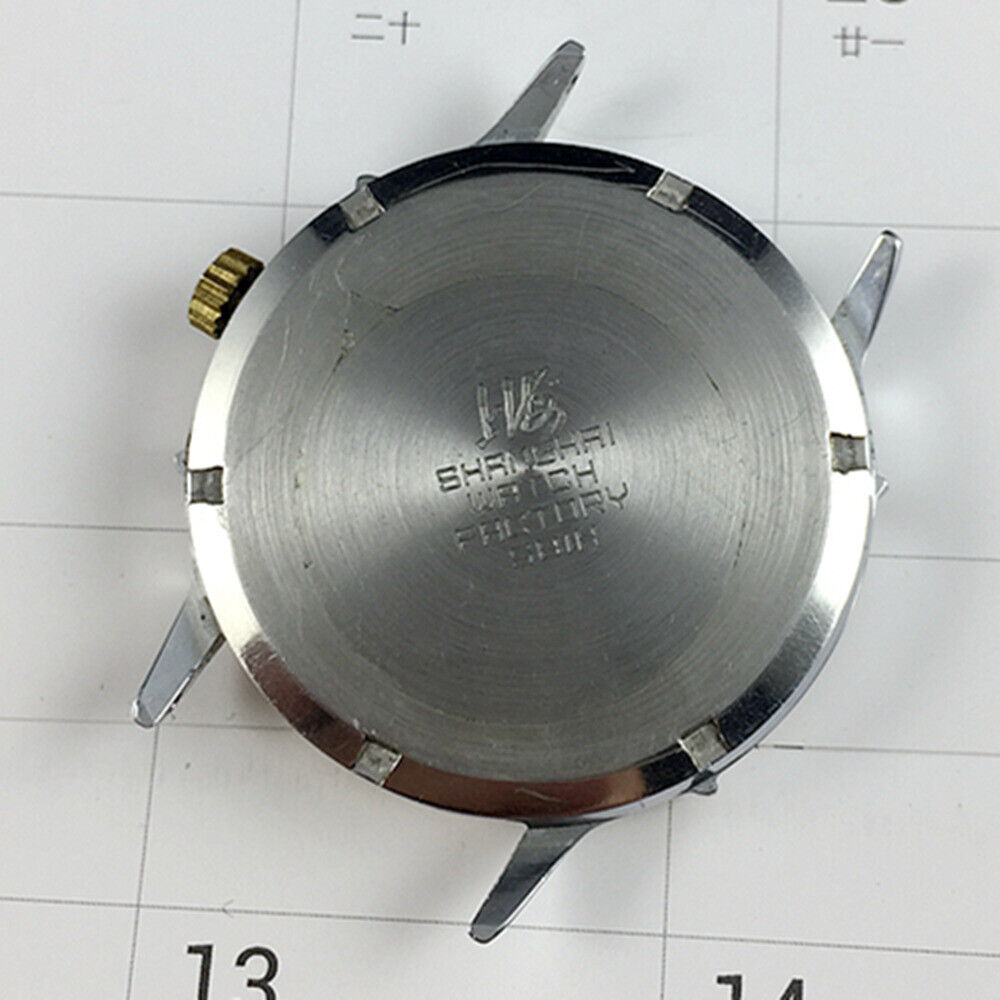 37mm SHANGHAI JINJI manual watch featuring 17 jewels and shock-resistant golden nail detailing.