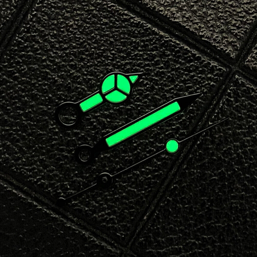 Classic multi-color green luminous watch hands with black trim for NH35 movements, perfect for watch repairs.