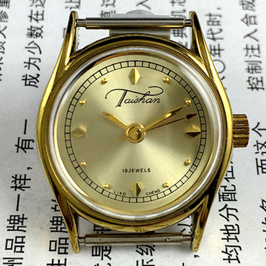 Liaocheng TAISHAN lady watch with manual mechanical movement, golden case, and 19 jewels.